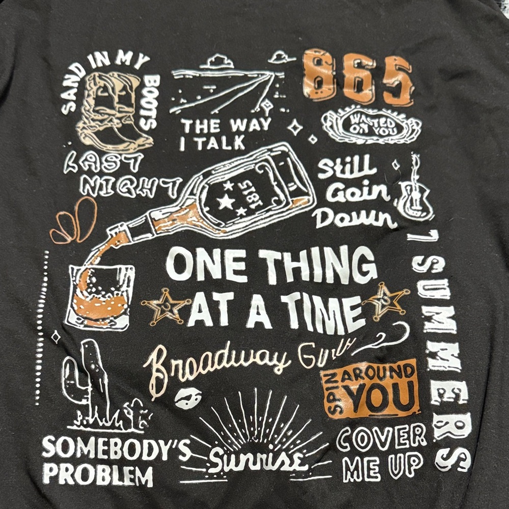 Graphic Tee "One Thing At A Time" in Black with White & Tan Print